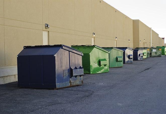 an aerial view of construction dumpsters placed on a large lot in Fairlawn